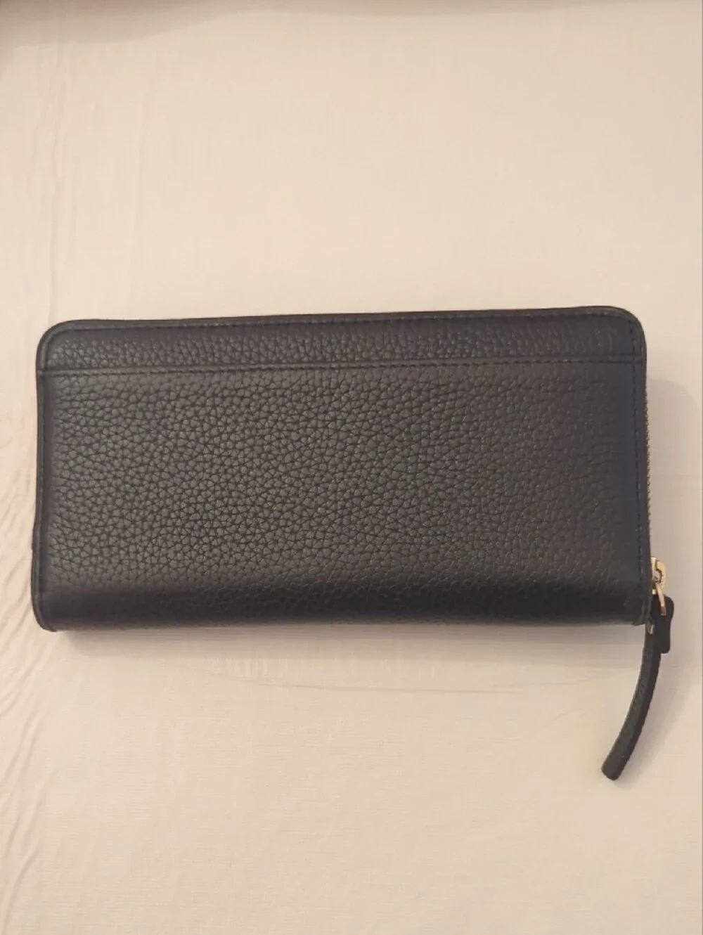 kate spade black pebbled leather tassel zip wallet